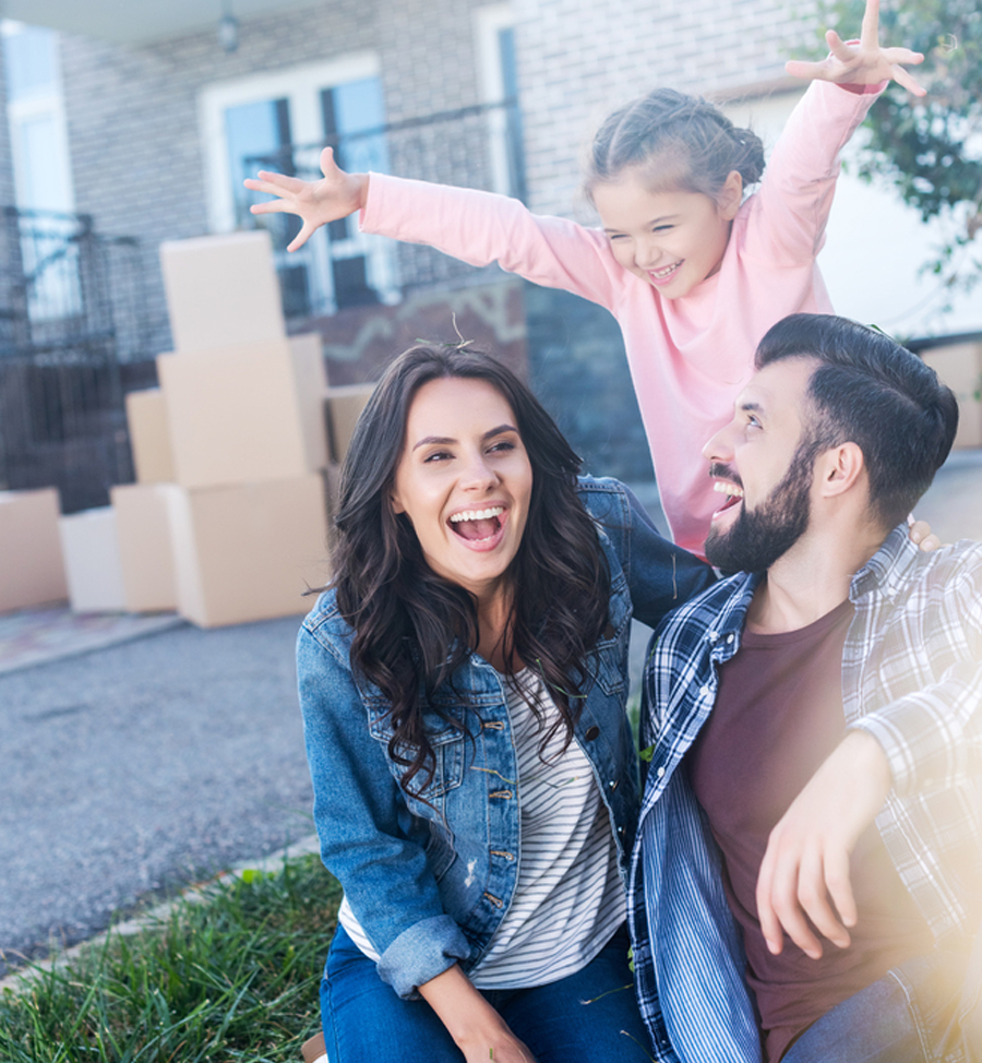 happy family in frontyard